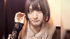 Bob-haired crossdresser pinches nipples while quietly masturbating solo