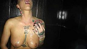 jezebelle bond soaps up her big tits and rubs pussy in steamy shower