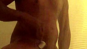 Solo woman trims her smooth body while bathing sensually in steamy shower