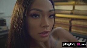 big boobed inked ebony harley dean strips lingerie bares shaved pierced pussy