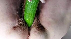 german granny oma shoves dildo and cucumber deep into her hairy wet beaver pussy