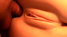 Close-up double penetration fucks this real doll's tight wet pussy hard