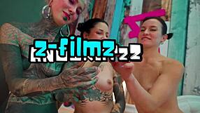 oiled skinny tattooed goths finger asses and share dildos in lesbian threesome