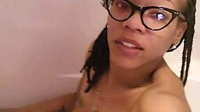 Ebony milf shaves smooth then relaxes in warm bath