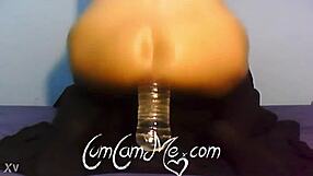 Cumcamme big ass teen rides water bottle deep anal on webcam
