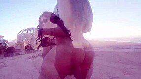 Ebony big ass strips naked on public beach