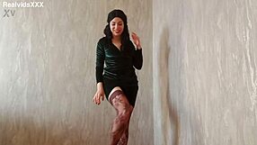 a brunette shaves pussy strips stockings teases natural tits to orgasm climax