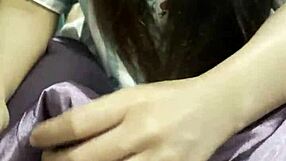 Asian girlfriend strokes boyfriend's cock passionately in dorm bedroom pov