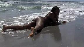 Ebony fat ass waves on beach public with dripping wet pussy dildo fucking clothes ripped