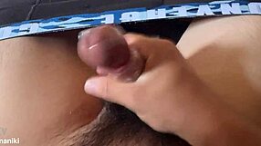 Japanese babe masturbates wildly with condom on her toy!