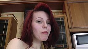 Redhead's massive tits teased in extreme close-up glory