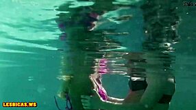 girls getting steamy with deep kisses and groping around the pool edge