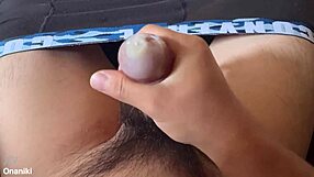 Japanese babe masturbates wildly with condom on her toy!