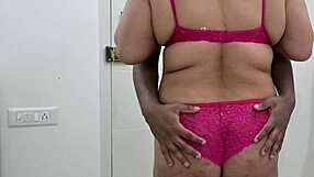 Swaying huge ebony ass in bikini tempts handjob for hubby's monster cock