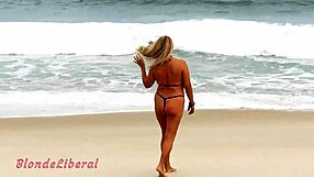 Showing off micro bikini to guys on rio beach