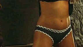 dominant madame whips gagged tied lesbian slave's big ass hard.