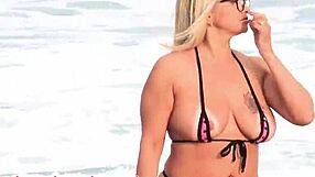 Showing off micro bikini to guys on rio beach