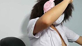 Beautiful latina student in uniform flashes her natural tits while getting excited over homework.