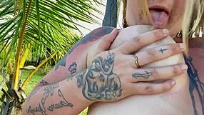 Blonde flashes hairy tits outdoors then masturbates to squirt publicly?