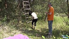 Cute curvy teen titty fucks outdoors in public field