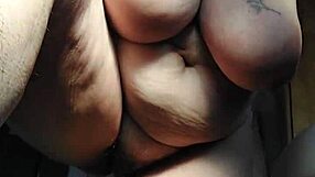 granny stuffs cucumber deep in her hairy wet pussy