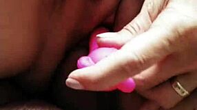 suggestive pink vibrator fucks her pussy and arse