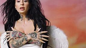 Joanna Angel bares naked milf curves hiding sexy tattoos