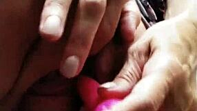 suggestive pink vibrator fucks her pussy and arse
