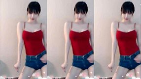 cute chinese girl dances up and down seductively