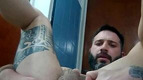 what happens when tattooed ass gets dildo fucked in kitchen?