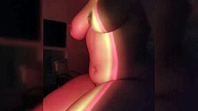 morena safada strips teasing in the dark bedroom ripping clothes