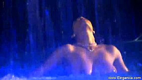 Brunette babe TEASES her natural tits and curves in erotic striptease dance