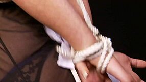 i love rubbing my big tits against hers while she's bound and gagging on my fingers