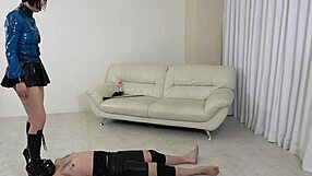 Japanese femdom Yuen smothers slave face then edges cock relentlessly