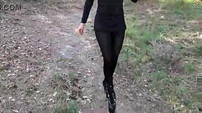 Milf struts confidently in sheer pantyhose and towering high heels