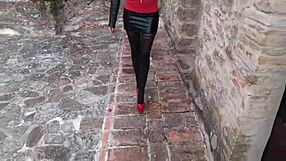 Milf struts confidently in sheer pantyhose and towering high heels