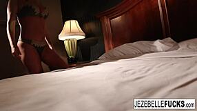 jezebelle bond strips lingerie teases her big tits and pussy