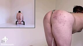 Watch this slave get caned hard in his cage from reverse angle!