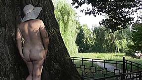 Hairy Mature's Naughty Nude Stroll in Crowded Public Park