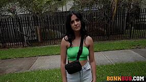 street girl sneaks italian sausage in car on busy usa street