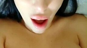 A sultry brunette fingers her dripping wet folds to intense climax