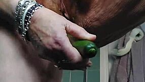 grandma fucks her hairy pussy hard with big cucumber