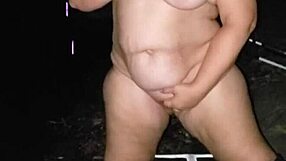 big titty milf strips outdoors then strokes cock to explosion