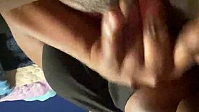 Ebony street hooker fingers her wet hairy pussy