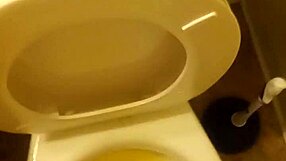21-Year-Old Pisses in Toilet Penis Peeking Out