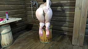 Brunette fingers anal hairy pussy to orgasm in russian bath golden shower