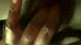 Ebony street hooker fingers her wet hairy pussy