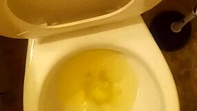 21-Year-Old Pisses in Toilet Penis Peeking Out