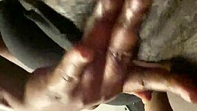 Ebony street hooker fingers her wet hairy pussy