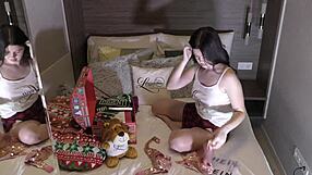 check out this super hot brunette babe playing with a cock till it cums as her christmas gift after trying on outfits